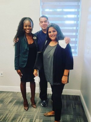 three-person-with-a-black-suits